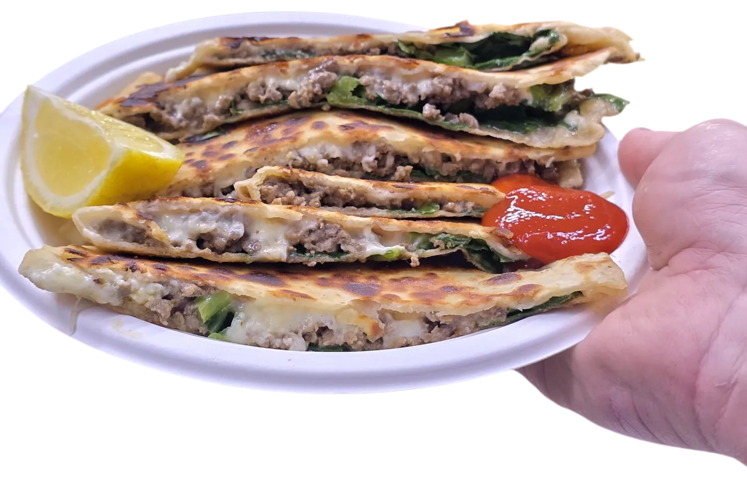 Sliced beef gözleme with lemon and chilli sauce