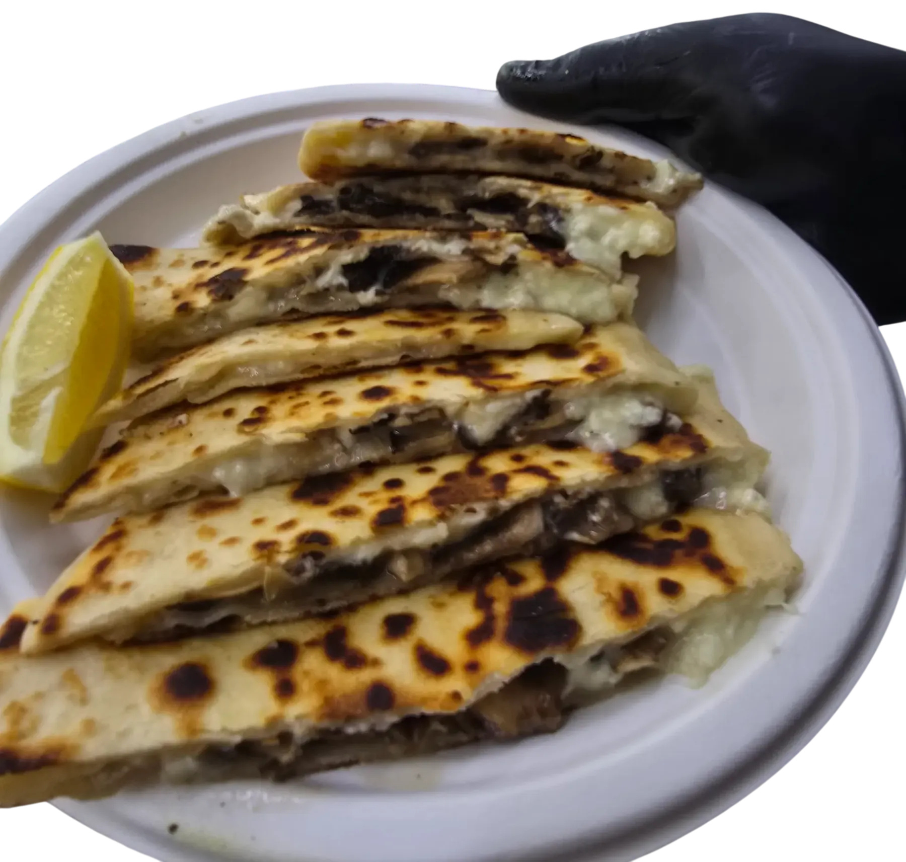 Mushroom and cheese gözleme served with lemon